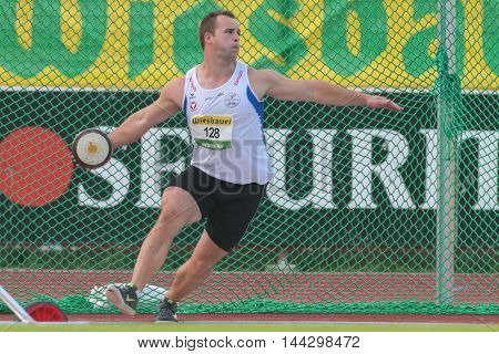 KAPFENBERG, AUSTRIA - AUGUST 8, 2015: Lukas  Weishaidinger (#128 Austria) participates in the national track and field championship.