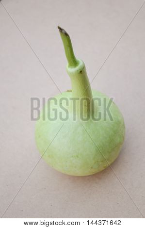 fresh green Bottle gourd on wooden floor - Lagenaria siceraria