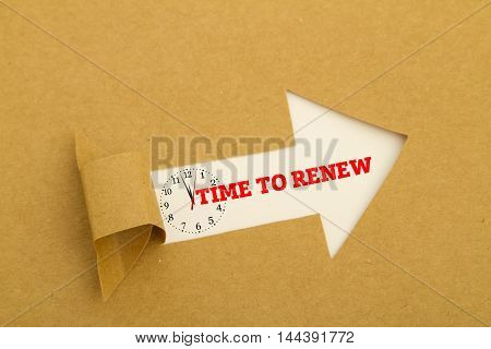 TIME TO RENEW message written under torn paper.