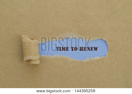 TIME TO RENEW message written under torn paper.