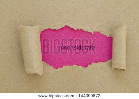inconsiderate word written under torn paper .