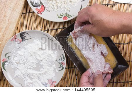 pork and flour with bread crumb for cooking tongkatsu / Cooking Japanese pork curry concept