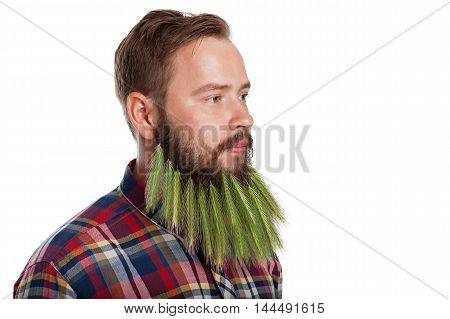 Portrait of handsome man with beard of spikelets isolated on white