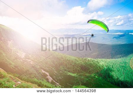 Paragliding with beautiful cloudscape background air runner