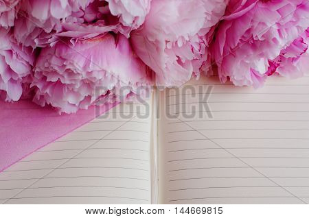 The empty form for records. Female diary. Outdoor notebook decorated with pink flowers