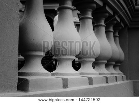 Vintage photo of plaster balustrade balusters, black and white photo