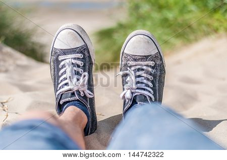 focus on shoes near the beach in Belgium