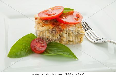 Southwest baked strada with sausage, cheese and tomatoes.
