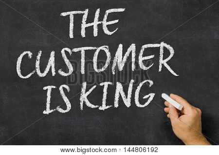 The Customer Is King Written On A Blackboard