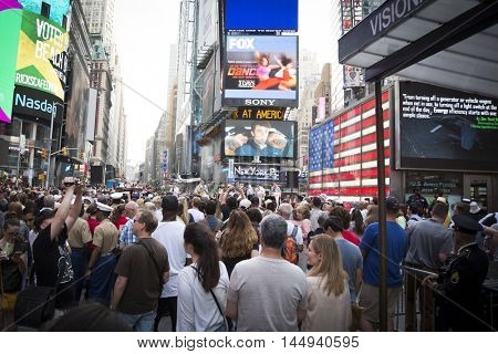 NEW YORK MAY 27 2016: Navy Band Northeast Rhode Island Sound perform a public concert next to the Armed Forces Recruiting Station on the Pedestrian Plaza in Times Square during Fleet Week NY 2016.