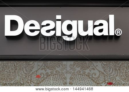Lyon, France - August 15, 2016:  Desigual logo on a wall of a store. Desigual is a clothing brand headquartered in Barcelona, Catalonia, Spain