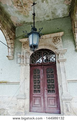 Entrance Door With Old Lamp Of Schonborn Hunting Castle In Carpaty,transcarpathia,ukraine.  Built In