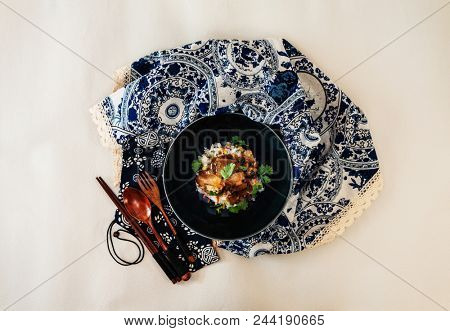 Vietnamese style caramel pork with rice and vegetable