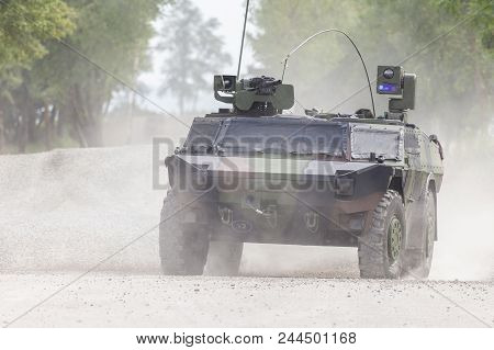 German Light Armoured  Reconnaissance Vehicle Drives On A Road