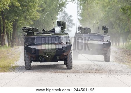 German Light Armoured  Reconnaissance Vehicle Drives On A Road