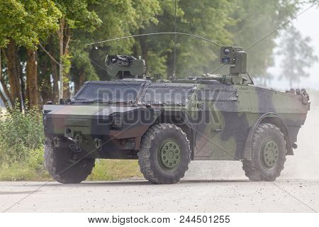 German Light Armoured  Reconnaissance Vehicle Drives On A Road