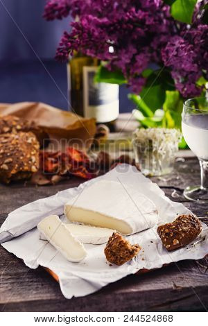 Brie Type Of Cheese. Camembert Cheese. Fresh Brie Cheese And Few Slices With Whole-grain Bun, Dry To