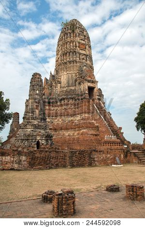View Of Chaiwattanaram Temple In Cloudy Day In Ayutthaya, Thailand.