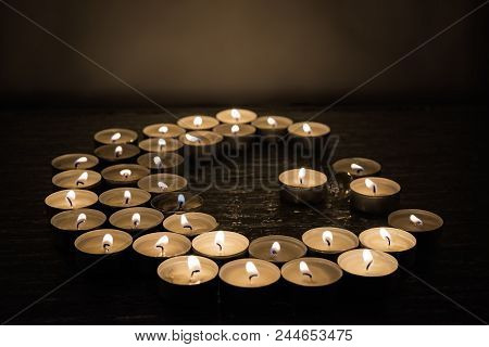 Symbols Of Islam. Candle Lights On Black Background. Abstract Isolated Photo.