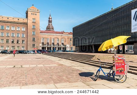 Riga, Latvia - April 30, 2018: Riflemen Square With The City Tour Bus In The Historic Center Of Riga