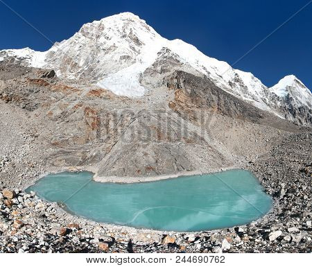 View Of Mount Pumori Or Pumo Ri From Pumori Base Camp With Frozen Lake, Sagarmatha National Park, Kh