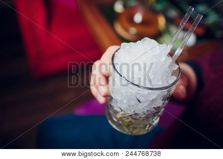 Bartender Hand Prepares A One Cocktail Ice