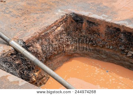 Layer Of Soil And Road Before Repairing Site