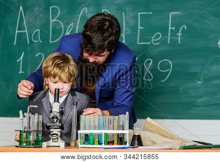 Following Father In Everything. Knowledge Day. My Father Is Scientist. Teacher Bearded Man Father An