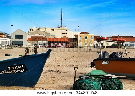 Miramar, Porto, Portugal- January 8, 2020: Colorful Fishing Boats Stranded On Aguda Beach And Little
