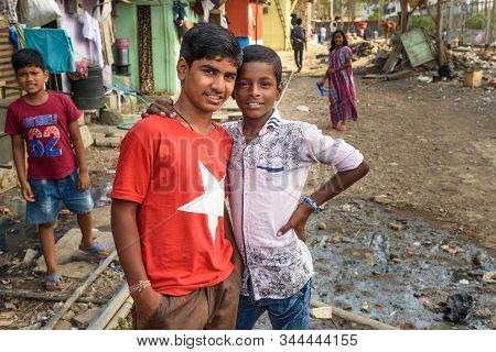 Mumbai, India - February 26, 2019: Indian Young Boys In Dharavi Slum At Mumbai