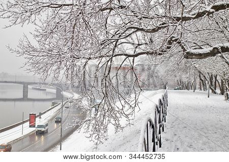Krutitskaya Embankment In Winter. View Of Moscow River And Musical Theater.