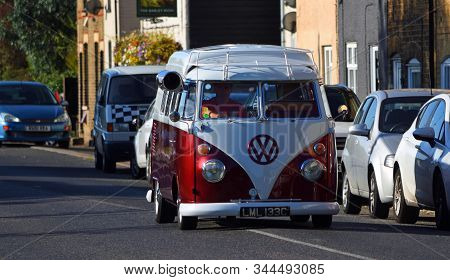 St Neots, Cambridgeshire, England - September 01, 2019: Classic Vw Camper Van Being Driven Along Str