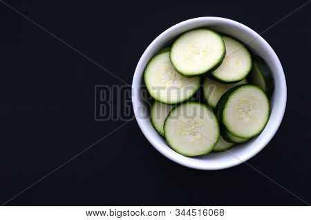 Carved Couchette In A White Bowl On A Black Background. Copy Space For Text.
