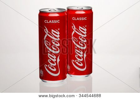 Moscow, Russia - 15.11.2019 : Two Red Isolated Can Of Coca-cola Stands On White Background.