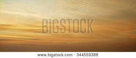 Abstract Blur Beautiful Bright Orange And Golden Sky At Sunset Sunrise For Background. Natural, Refl