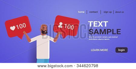Man Holding Notification Icons African American Blogger Excited About Followers Activity On Social M