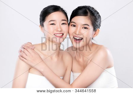 Portrait Two Beautiful Young Asian Woman Clean Fresh Bare Skin Concept.  Asian Girl Beauty Face Skin