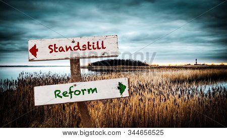 Street Sign The Direction Way To Reform Versus Standstill