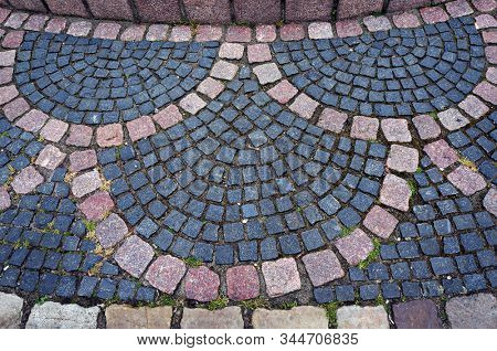 Pattern of stone pavement in Bodenwerder, Germany.