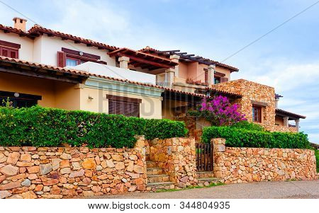 Scenery With House And Cottage At Capo Coda Cavallo Reflex