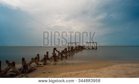 Dilapidated Old Fishing Dock Collapsing Into The Sea In Pak Nam Pran On The Gulf Of Thailand In Thai