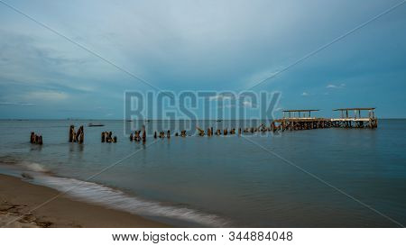 Dilapidated Old Fishing Dock Collapsing Into The Sea In Pak Nam Pran On The Gulf Of Thailand In Thai