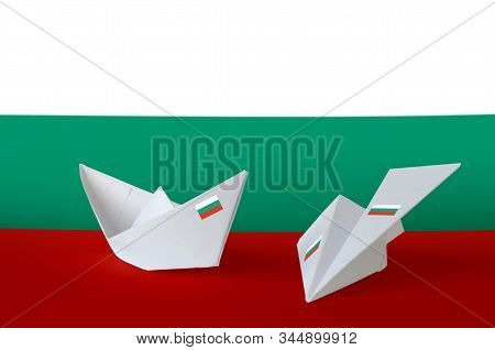 Bulgaria Flag Depicted On Paper Origami Airplane And Boat. Handmade Arts Concept