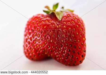 Red Strawberry On White Background Close - Up Isolated In Soft Light