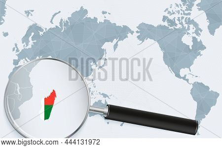 Asia Centered World Map With Magnified Glass On Madagascar. Focus On Map Of Madagascar On Pacific-ce