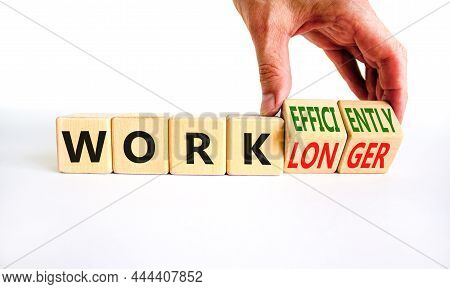 Work Longer Or Efficiently Symbol. Businessman Turns Cubes And Changes Words Work Longer To Work Eff