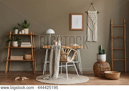 Modern Composition At Boho Interior Of Home Office Room With Wooden Desk, Stylish Armchair, Bamboo S