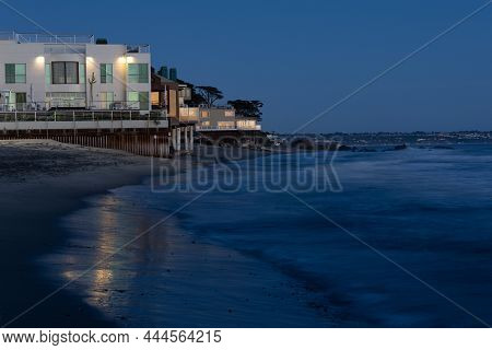 Malibu, Ca - December 26 2021:  Row Of Beach Houses Just After Sunset In Malibu