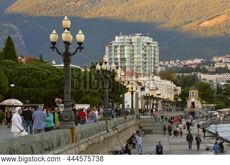 Yalta, Crimea, Russia-05.05.2019: Vacationers Walk Along The Main Promenade Of Yalta-the Capital Of 