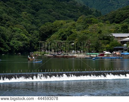 Japanese People And Foreign Traveler Travel Visit Relax Recreation Paddle Boat In Oi River With View